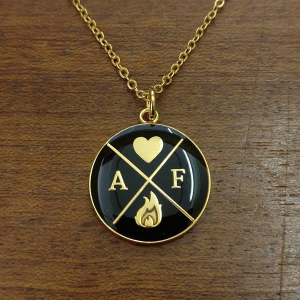 amor-fati-logo-black-and-gold-enamelled-pendant